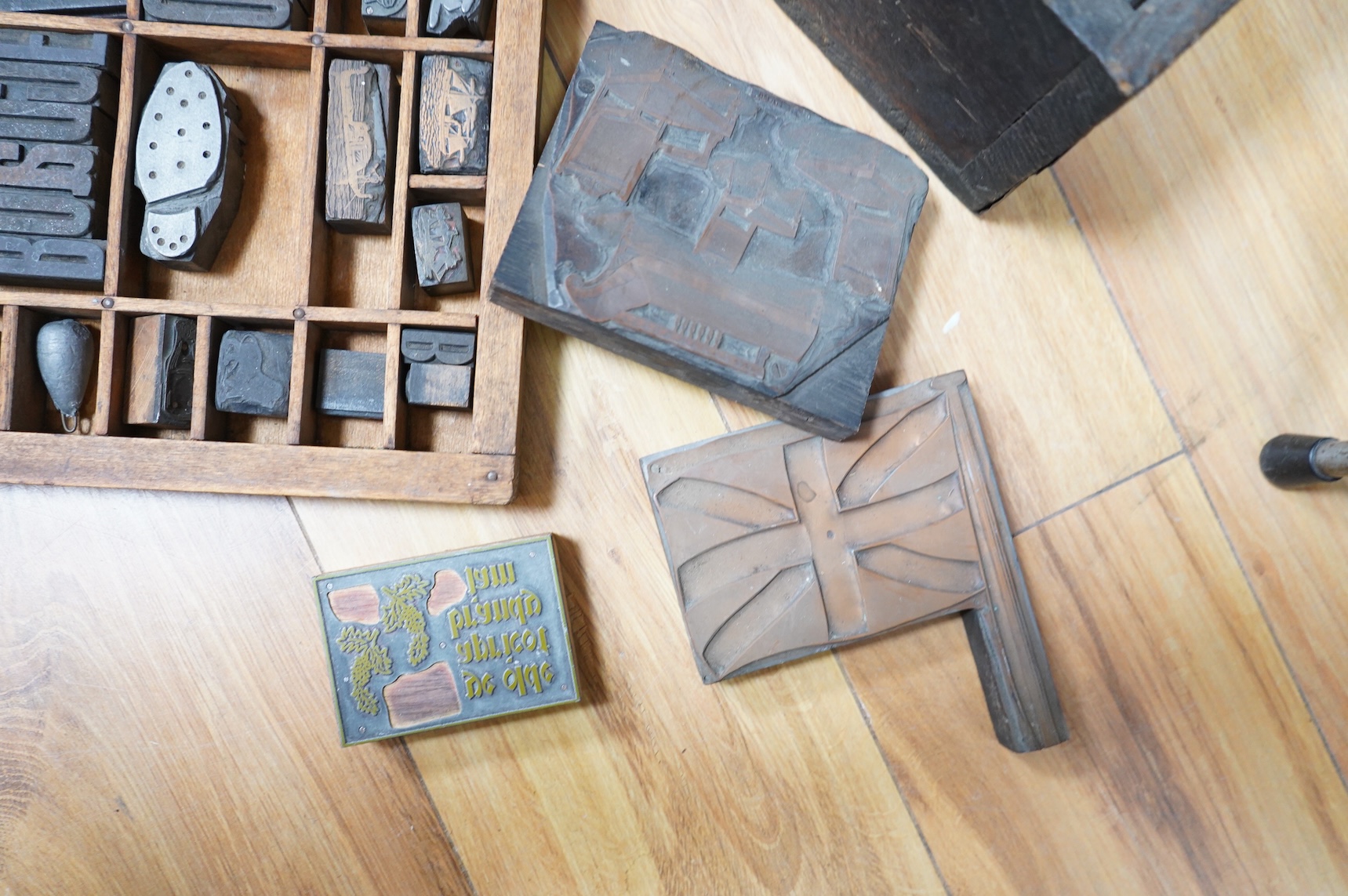 A printer's tray and various type-sets